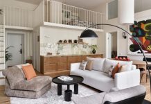 Однушка 90 м² с арочными окнами и спальней на антресоли в доходном доме Петербурга